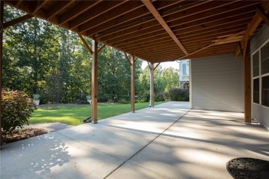 Tucked away on a wooded lot in Cresswind at Lake Lanier, a on Lanier Island Legacy Golf Couorse in Georgia - for sale on GolfHomes.com, golf home, golf lot