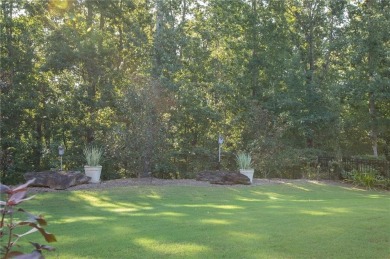 Tucked away on a wooded lot in Cresswind at Lake Lanier, a on Lanier Island Legacy Golf Couorse in Georgia - for sale on GolfHomes.com, golf home, golf lot