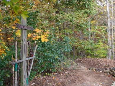 Tucked away on a wooded lot in Cresswind at Lake Lanier, a on Lanier Island Legacy Golf Couorse in Georgia - for sale on GolfHomes.com, golf home, golf lot