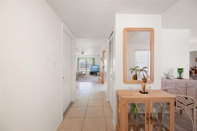 What a GEM of a home!  This home is warm and welcoming once you on Highland Lakes Executive Golf Course in Florida - for sale on GolfHomes.com, golf home, golf lot