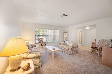 What a GEM of a home!  This home is warm and welcoming once you on Highland Lakes Executive Golf Course in Florida - for sale on GolfHomes.com, golf home, golf lot