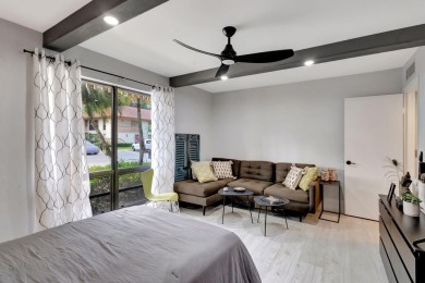 Tastefully Remodeled 1st Floor Golf Villa Unit. Front Bedroom on PGA National Golf Club in Florida - for sale on GolfHomes.com, golf home, golf lot