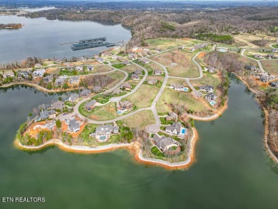 Indulge in the opulence of lakeside living within the on Wind River Golf Course in Tennessee - for sale on GolfHomes.com, golf home, golf lot