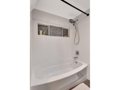 Tastefully Remodeled 1st Floor Golf Villa Unit. Front Bedroom on PGA National Golf Club in Florida - for sale on GolfHomes.com, golf home, golf lot