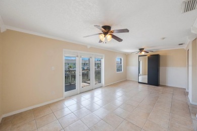 Sporting pastel-colored, Bermuda-styled exteriors, this on St. Petersburg Country Club in Florida - for sale on GolfHomes.com, golf home, golf lot