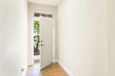 Just Renovated 2 bed 2 bath 2006 corner waterfront townhouse on Oak Harbor Country Club in Florida - for sale on GolfHomes.com, golf home, golf lot