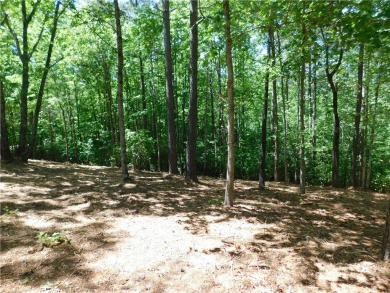 Beautifully wooded lot with gentle build site and some long on The Cliffs At Keowee Falls in South Carolina - for sale on GolfHomes.com, golf home, golf lot