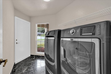 GOLF COMMUNITY - Discover the perfect blend of luxury and on Ventura Country Club in Florida - for sale on GolfHomes.com, golf home, golf lot