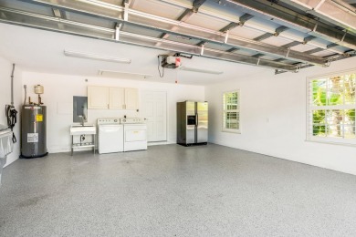 Just Renovated 2 bed 2 bath 2006 corner waterfront townhouse on Oak Harbor Country Club in Florida - for sale on GolfHomes.com, golf home, golf lot