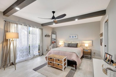 Tastefully Remodeled 1st Floor Golf Villa Unit. Front Bedroom on PGA National Golf Club in Florida - for sale on GolfHomes.com, golf home, golf lot