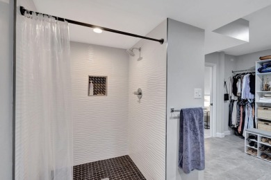 Tastefully Remodeled 1st Floor Golf Villa Unit. Front Bedroom on PGA National Golf Club in Florida - for sale on GolfHomes.com, golf home, golf lot