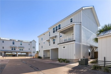 Gorgeous 4 bedroom townhome with water view in town! This 3 on Palmilla Beach Golf Club in Texas - for sale on GolfHomes.com, golf home, golf lot