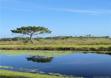 What a view! Canal! Wildlife! Golf! You have it all from your on Indianwood Golf and Country Club in Florida - for sale on GolfHomes.com, golf home, golf lot