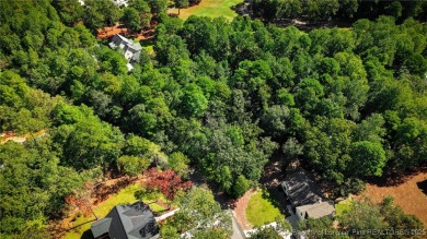 Nestled in the serene community of Seven Lakes South, this prime on Seven Lakes Country Club in North Carolina - for sale on GolfHomes.com, golf home, golf lot