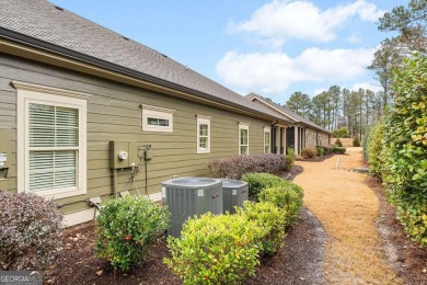 Looks can be deceiving this immaculate townhome is far more on Bentwater Golf Club in Georgia - for sale on GolfHomes.com, golf home, golf lot