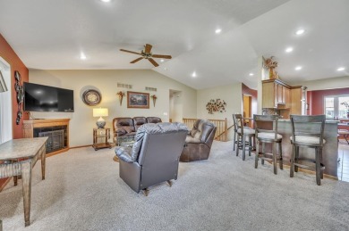 Enjoy golf course living in this beautifully maintained on Indian Hills Golf Club in Iowa - for sale on GolfHomes.com, golf home, golf lot