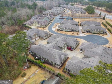 Looks can be deceiving this immaculate townhome is far more on Bentwater Golf Club in Georgia - for sale on GolfHomes.com, golf home, golf lot