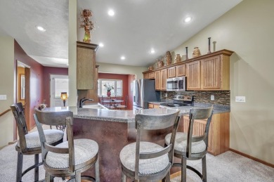 Enjoy golf course living in this beautifully maintained on Indian Hills Golf Club in Iowa - for sale on GolfHomes.com, golf home, golf lot