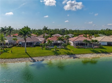 Breathtaking Waterfront Living in the Heart of Herons Glen Step on Herons Glen Golf and Country Club in Florida - for sale on GolfHomes.com, golf home, golf lot