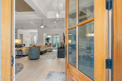 Experience the pinnacle of coastal elegance in this like-new on Members Club At St. James Plantation in North Carolina - for sale on GolfHomes.com, golf home, golf lot