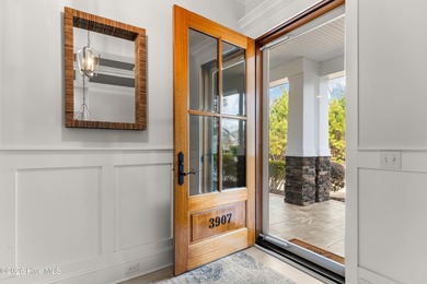 Experience the pinnacle of coastal elegance in this like-new on Members Club At St. James Plantation in North Carolina - for sale on GolfHomes.com, golf home, golf lot