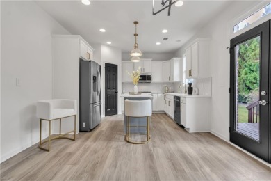 Discover this completely renovated 5-bedroom, 2.5-bathroom home on Wolf Creek Golf Course in Georgia - for sale on GolfHomes.com, golf home, golf lot