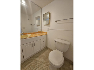 Great price for this large unit in sought after Palm Aire CC! on Palm-Aire Country Club and Resort - Palms in Florida - for sale on GolfHomes.com, golf home, golf lot