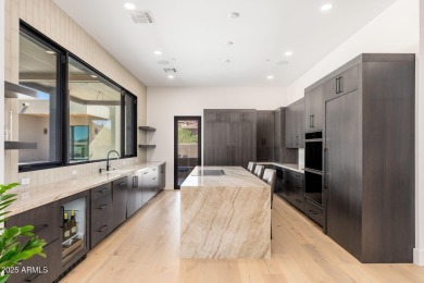 This newly constructed home combines Southwestern contemporary on Desert Highlands Golf Club in Arizona - for sale on GolfHomes.com, golf home, golf lot