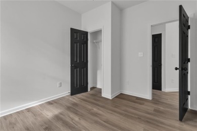 Discover this completely renovated 5-bedroom, 2.5-bathroom home on Wolf Creek Golf Course in Georgia - for sale on GolfHomes.com, golf home, golf lot