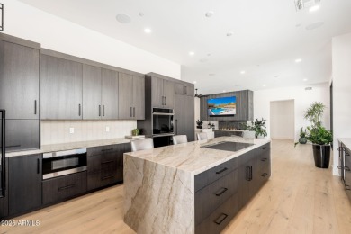 This newly constructed home combines Southwestern contemporary on Desert Highlands Golf Club in Arizona - for sale on GolfHomes.com, golf home, golf lot