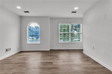 Discover this completely renovated 5-bedroom, 2.5-bathroom home on Wolf Creek Golf Course in Georgia - for sale on GolfHomes.com, golf home, golf lot
