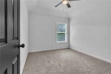 Discover this completely renovated 5-bedroom, 2.5-bathroom home on Wolf Creek Golf Course in Georgia - for sale on GolfHomes.com, golf home, golf lot