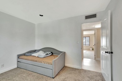 Welcome to this fantastic corner unit Townhouse in the on Fountains Golf and Country Club in Florida - for sale on GolfHomes.com, golf home, golf lot