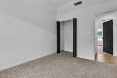 Discover this completely renovated 5-bedroom, 2.5-bathroom home on Wolf Creek Golf Course in Georgia - for sale on GolfHomes.com, golf home, golf lot
