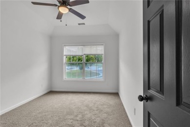 Discover this completely renovated 5-bedroom, 2.5-bathroom home on Wolf Creek Golf Course in Georgia - for sale on GolfHomes.com, golf home, golf lot