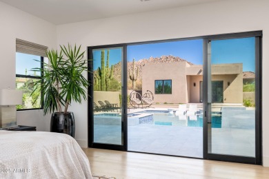 This newly constructed home combines Southwestern contemporary on Desert Highlands Golf Club in Arizona - for sale on GolfHomes.com, golf home, golf lot