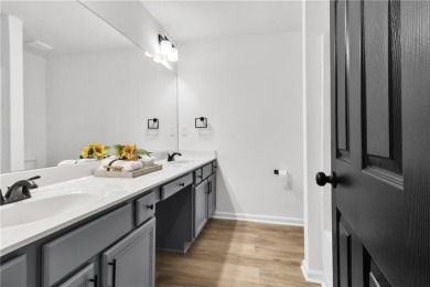 Discover this completely renovated 5-bedroom, 2.5-bathroom home on Wolf Creek Golf Course in Georgia - for sale on GolfHomes.com, golf home, golf lot