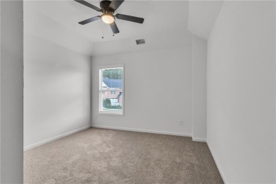 Discover this completely renovated 5-bedroom, 2.5-bathroom home on Wolf Creek Golf Course in Georgia - for sale on GolfHomes.com, golf home, golf lot