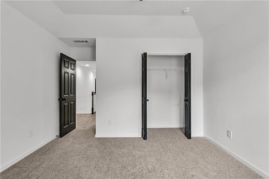 Discover this completely renovated 5-bedroom, 2.5-bathroom home on Wolf Creek Golf Course in Georgia - for sale on GolfHomes.com, golf home, golf lot
