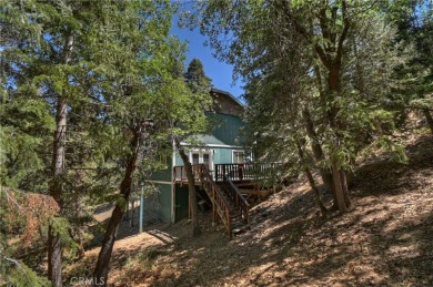 Welcome to your secluded retreat in the heart of Big Bear Lake! on Big Bear Mountain Ski and Golf Resort in California - for sale on GolfHomes.com, golf home, golf lot