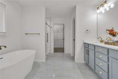 Discover this completely renovated 5-bedroom, 2.5-bathroom home on Wolf Creek Golf Course in Georgia - for sale on GolfHomes.com, golf home, golf lot