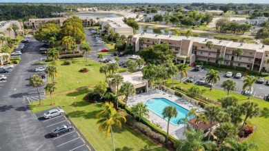 Welcome to this fantastic corner unit Townhouse in the on Fountains Golf and Country Club in Florida - for sale on GolfHomes.com, golf home, golf lot
