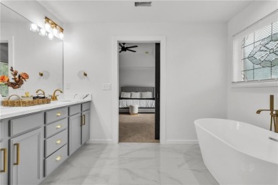 Discover this completely renovated 5-bedroom, 2.5-bathroom home on Wolf Creek Golf Course in Georgia - for sale on GolfHomes.com, golf home, golf lot