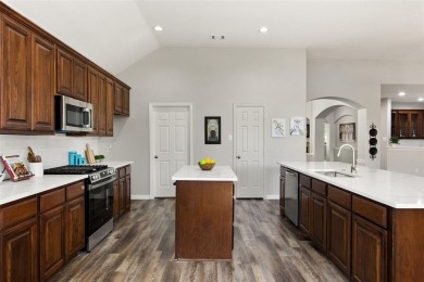 Refined one story residence in prestigious Lantana, showcasing a on Lantana Golf Club in Texas - for sale on GolfHomes.com, golf home, golf lot