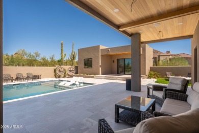 This newly constructed home combines Southwestern contemporary on Desert Highlands Golf Club in Arizona - for sale on GolfHomes.com, golf home, golf lot