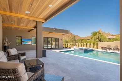 This newly constructed home combines Southwestern contemporary on Desert Highlands Golf Club in Arizona - for sale on GolfHomes.com, golf home, golf lot