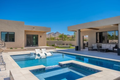 This newly constructed home combines Southwestern contemporary on Desert Highlands Golf Club in Arizona - for sale on GolfHomes.com, golf home, golf lot