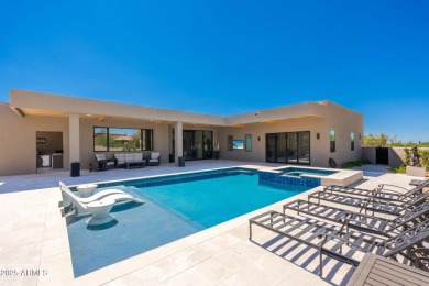 This newly constructed home combines Southwestern contemporary on Desert Highlands Golf Club in Arizona - for sale on GolfHomes.com, golf home, golf lot