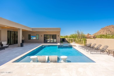 This newly constructed home combines Southwestern contemporary on Desert Highlands Golf Club in Arizona - for sale on GolfHomes.com, golf home, golf lot