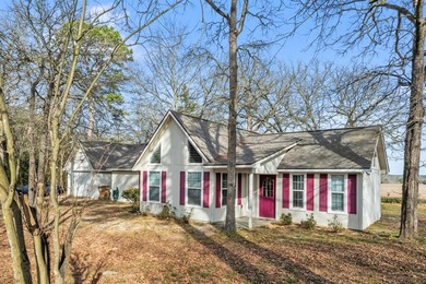 Tucked away on a beautifully wooded lot in the heart of East on Holly Lake Ranch Golf Club in Texas - for sale on GolfHomes.com, golf home, golf lot